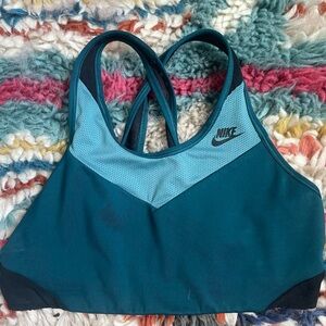 backless high neck Nike sports bra with mesh cutouts